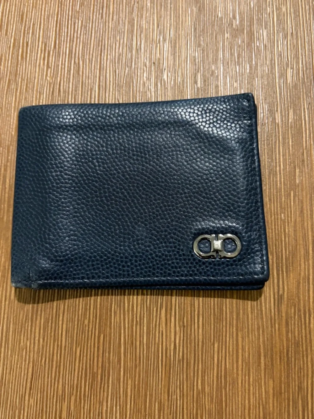 Salvatore Ferragamo men's textured leather bifold wallet with Gancini logo